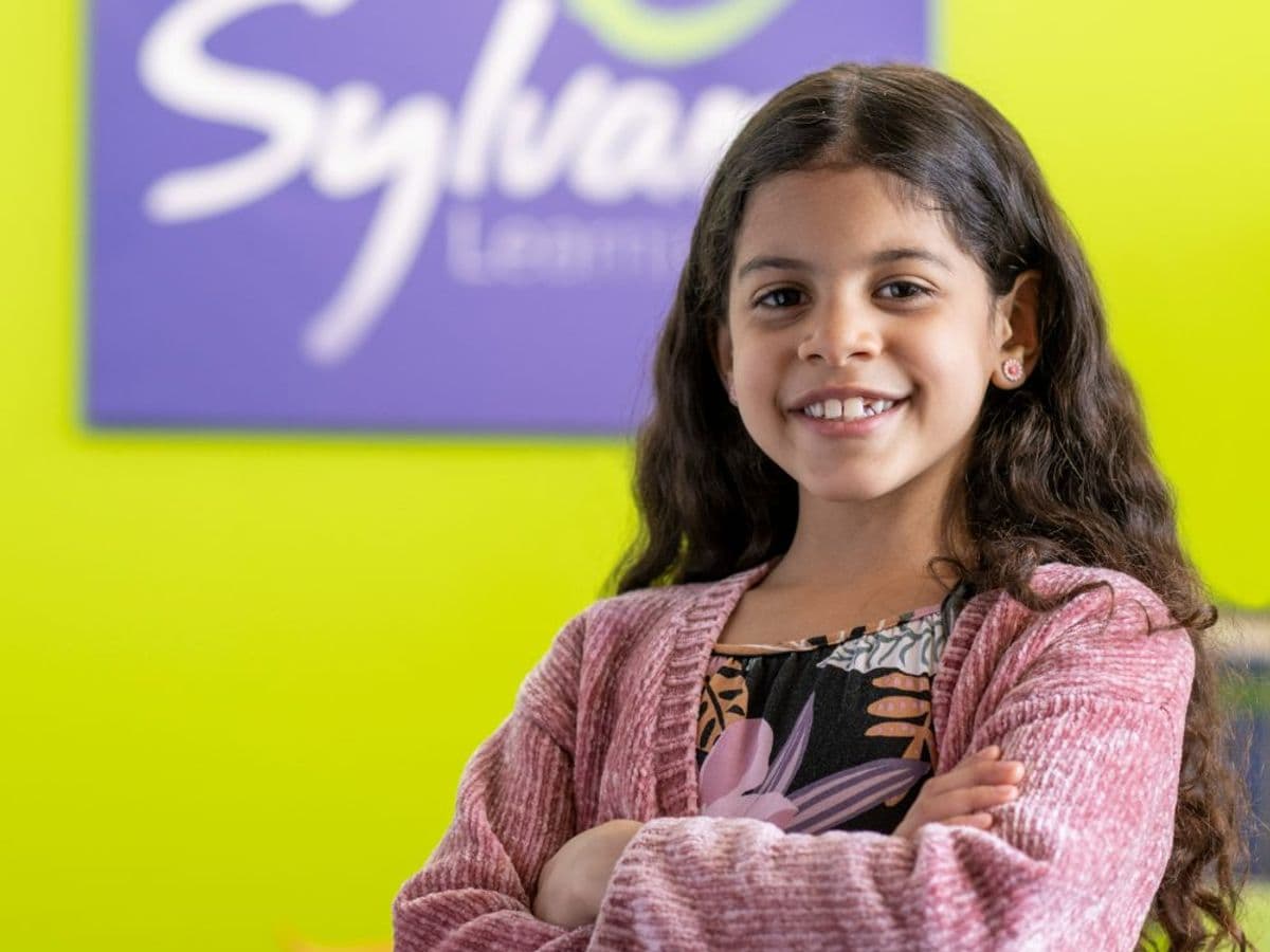 A student smiling during a tutoring session