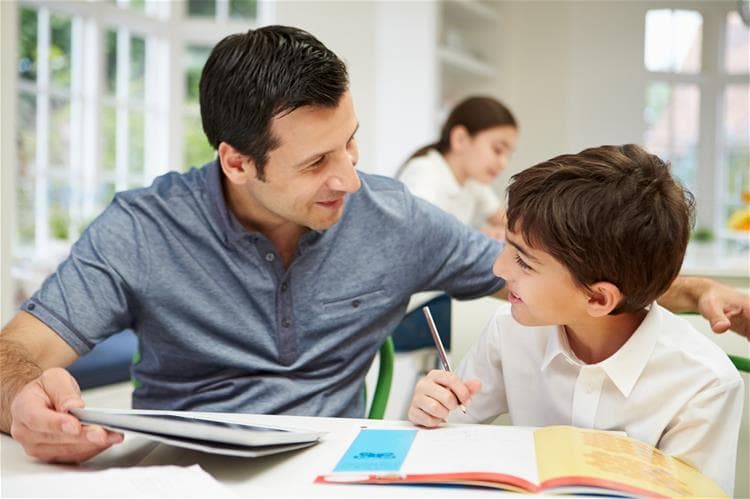 child-and-dad-boy-elementary-talking-to-child-parent